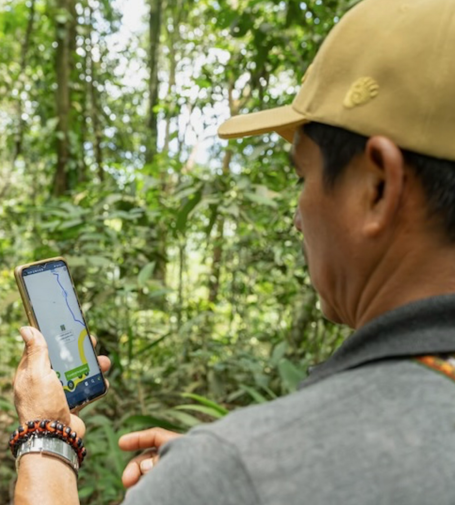 Field team member using phone-based LIDAR in the forest